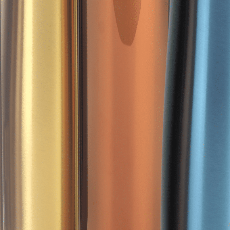 Close up image of silver, gold, and bronze metals